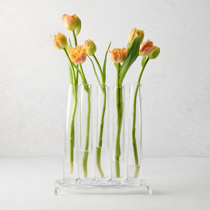 Elli Small Scissor-Cut Glass Vase, clear, rectangular base with five individual tubes holding orange tulips.