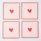 Set of 4 square cotton coasters with pale pink and white stripes, red embroidered hearts, and red edges.