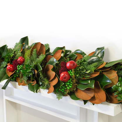 Fresh 6' holiday garland with green magnolia leaves, spruce, and red pomegranates.