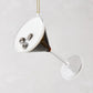 Glass Espresso Martini Christmas ornament, 4"H, with dark liquid, white foam, and three coffee beans.