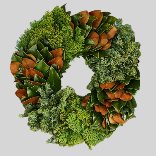 Hudson Grace 18-inch Evergreen Trinity Wreath featuring layered green cedar, pine needles, and brown magnolia leaves.