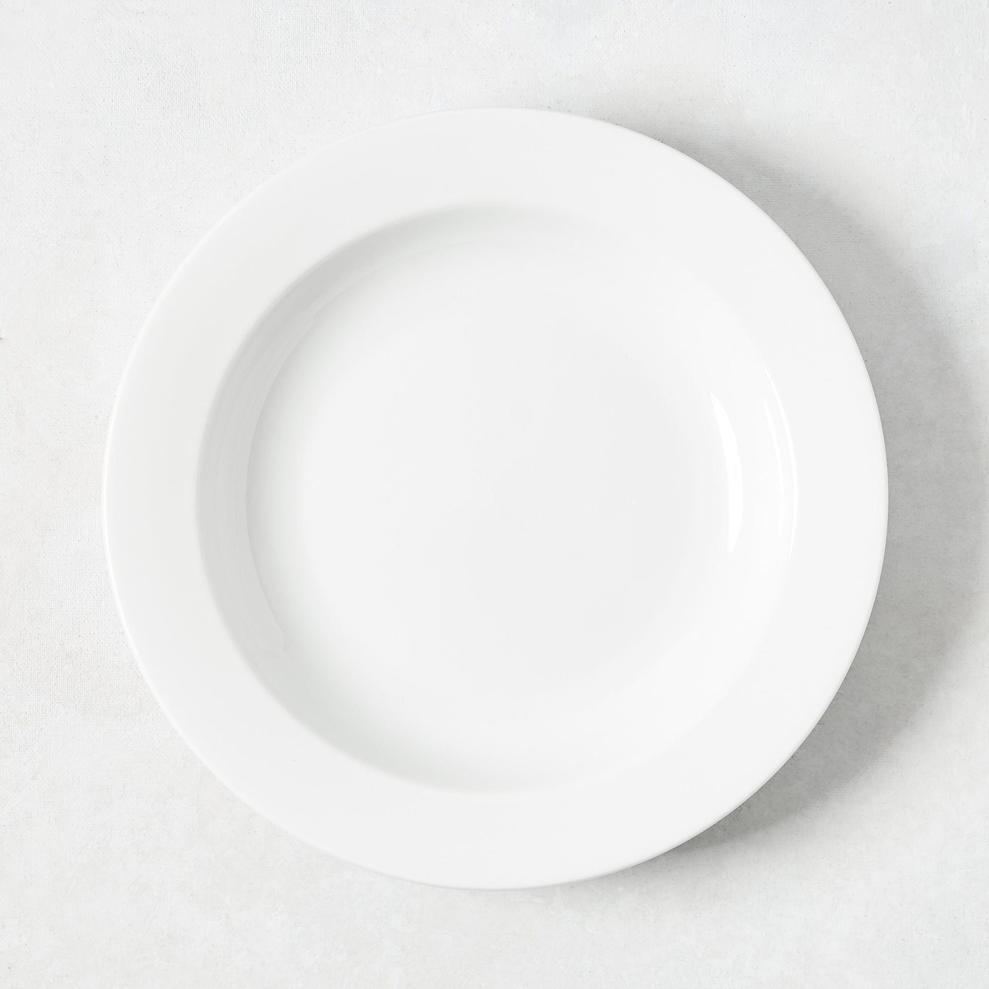 Hudson Grace Everyday Porcelain Bowl, classic white, 9.3" Dia, with a wide rim.