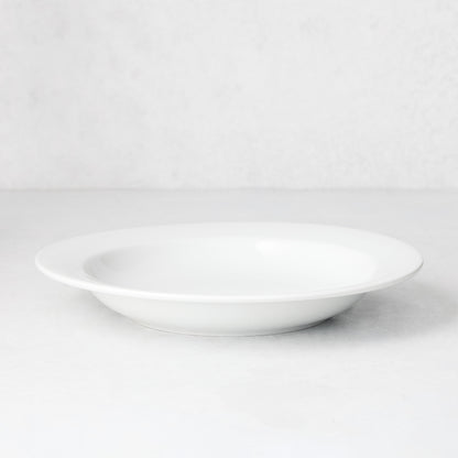 Everyday Porcelain Bowl, a classic white soup bowl with a wide rim.