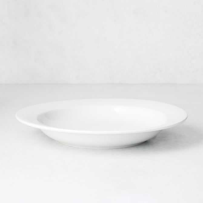 Everyday Porcelain Bowl, a classic white soup bowl with a wide rim.