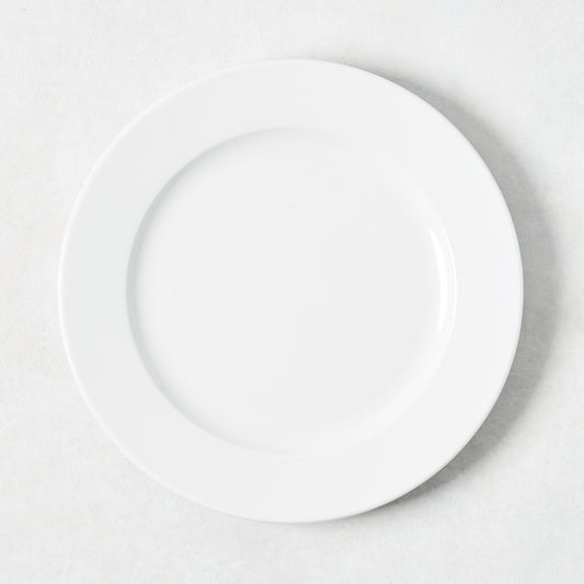 White porcelain salad plate with a classic rim from the Everyday Collection.