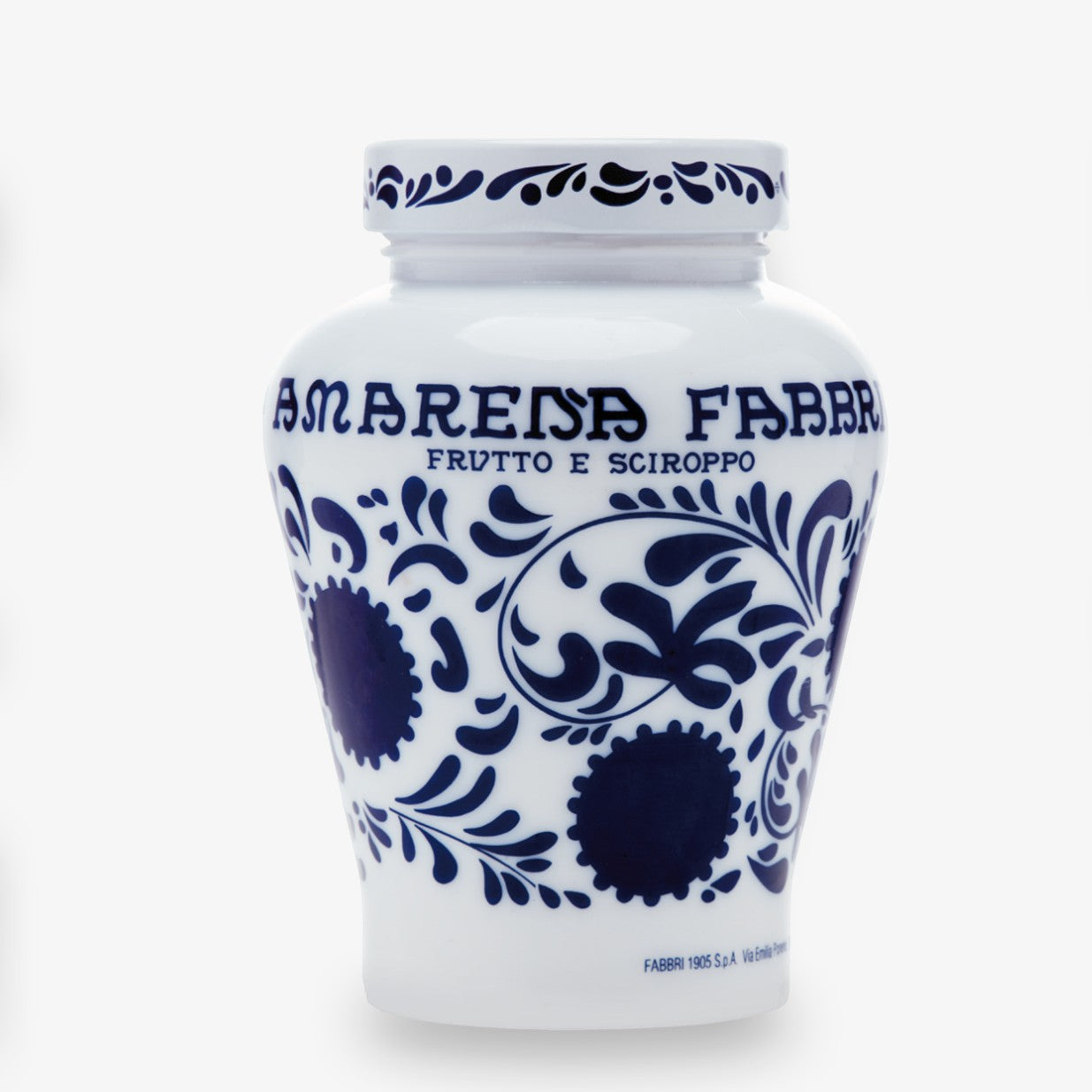 White ceramic Fabbri Amarena cherries jar with blue floral design and "AMARENA FABBRI" text.