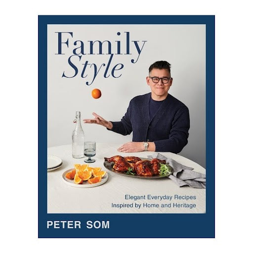 Family Style" cookbook by Peter Som, featuring a man, food, and an orange on a white table.