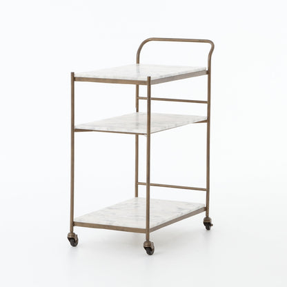Felix antique brass bar cart with three white marble rectangular shelves and casters.
