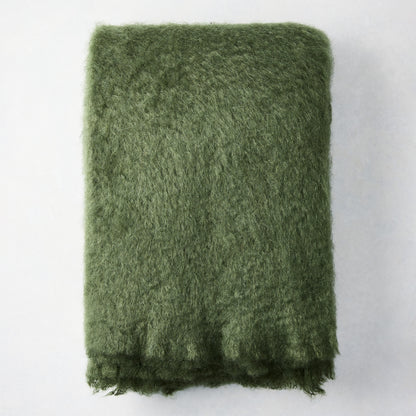 Folded Fern Green Mohair Throw Blanket, 72"L x 51"W, with a soft, shaggy texture.