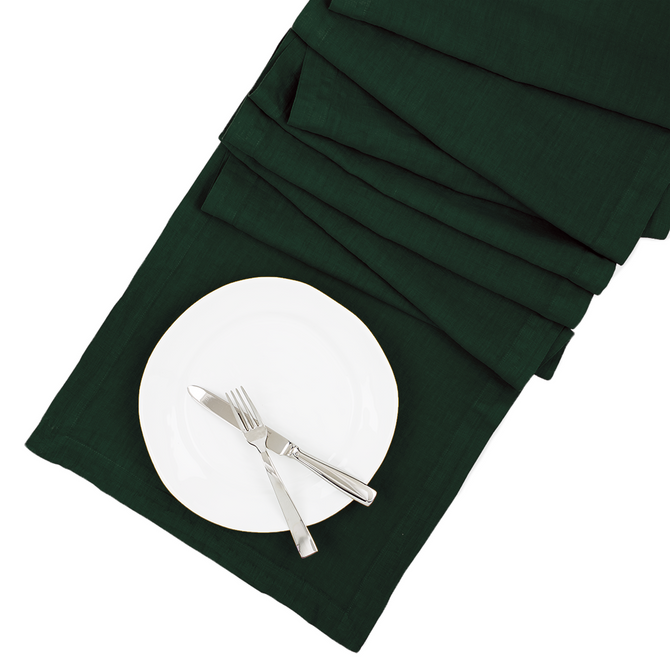 Fir HG hand-dyed dark green linen table runner, 18"x108", with white plate and silverware.