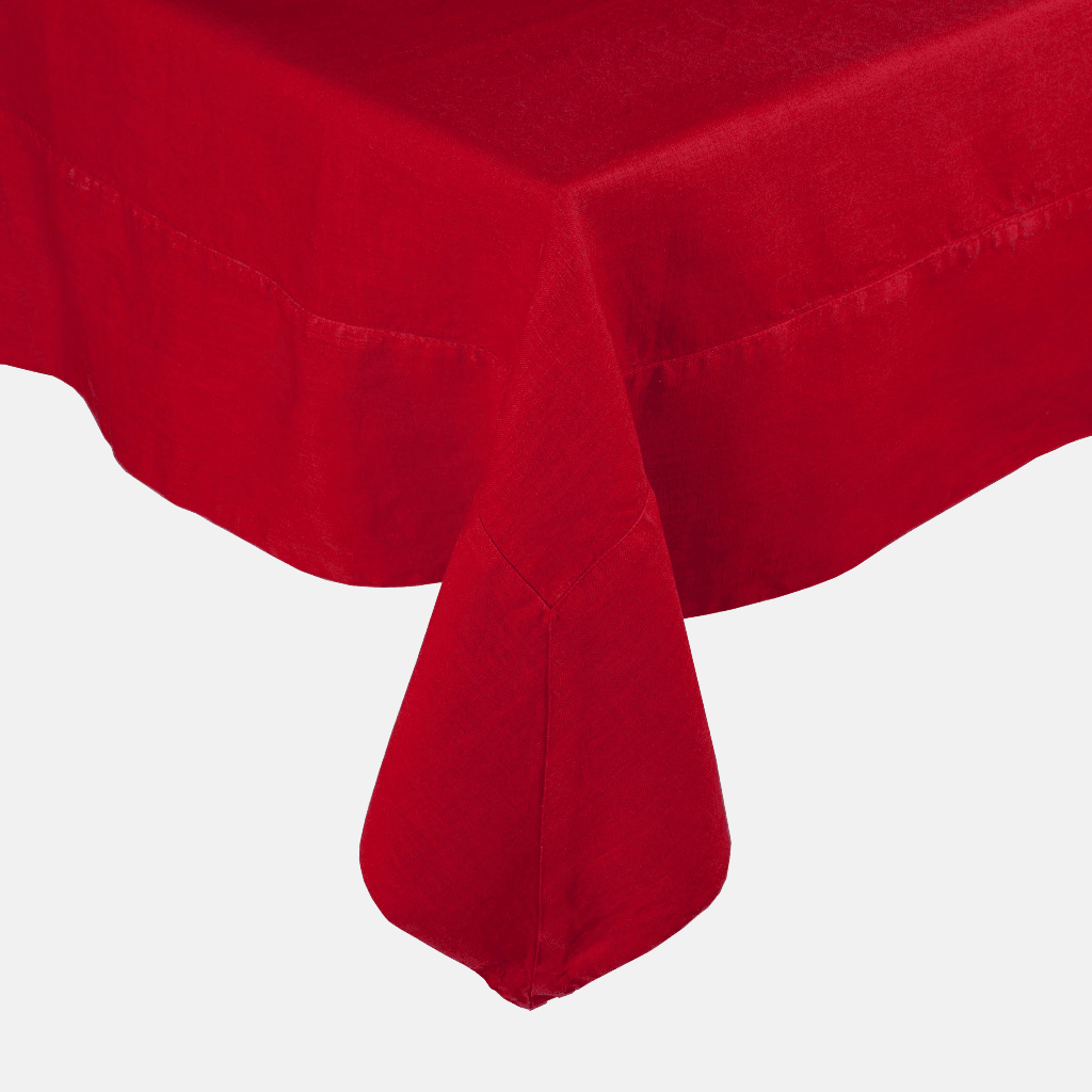 Flame HG Signature hand-dyed red linen tablecloth with a generous border and mitered corner detailing.