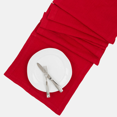 Flame HG Signature hand-dyed red linen table runner with white plate and silverware.