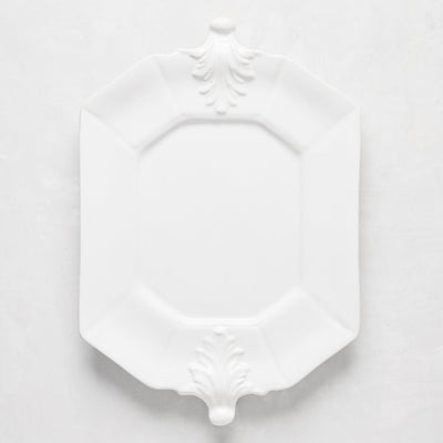 White octagon ceramic serving platter with Fleur de Lys detailing, 10.75"W x 15"L.