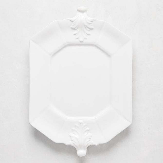 White octagon ceramic serving platter with Fleur de Lys detailing, 10.75"W x 15"L.