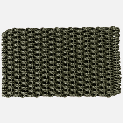 Rectangular forest green handwoven rope doormat with a durable braided texture for all-weather outdoor use.