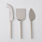 Forged silver 3-piece cheese knife set with hammered stainless steel handles.