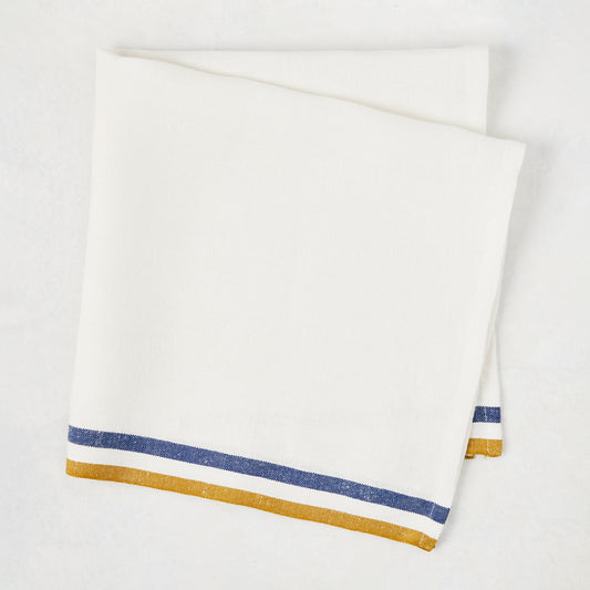 Folded French Blue and Yellow Double Stripe Linen Napkin, 20" square.