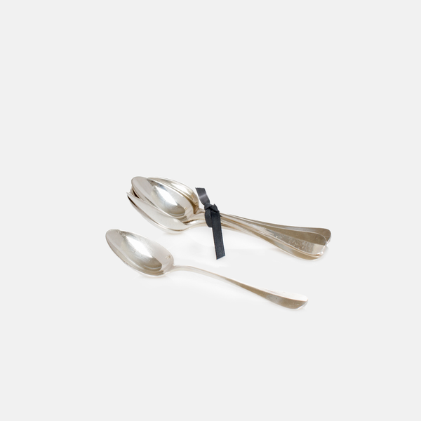 Set of 6 French vintage silver demitasse spoons, 5.5" L, with one spoon separate and five tied with a black ribbon.