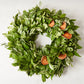 Fresh Citrus Sunrise Wreath, 18" olive and salal leaves with dried citrus slices.