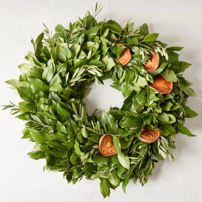 Fresh Citrus Sunrise Wreath, 18" olive and salal leaves with dried citrus slices.