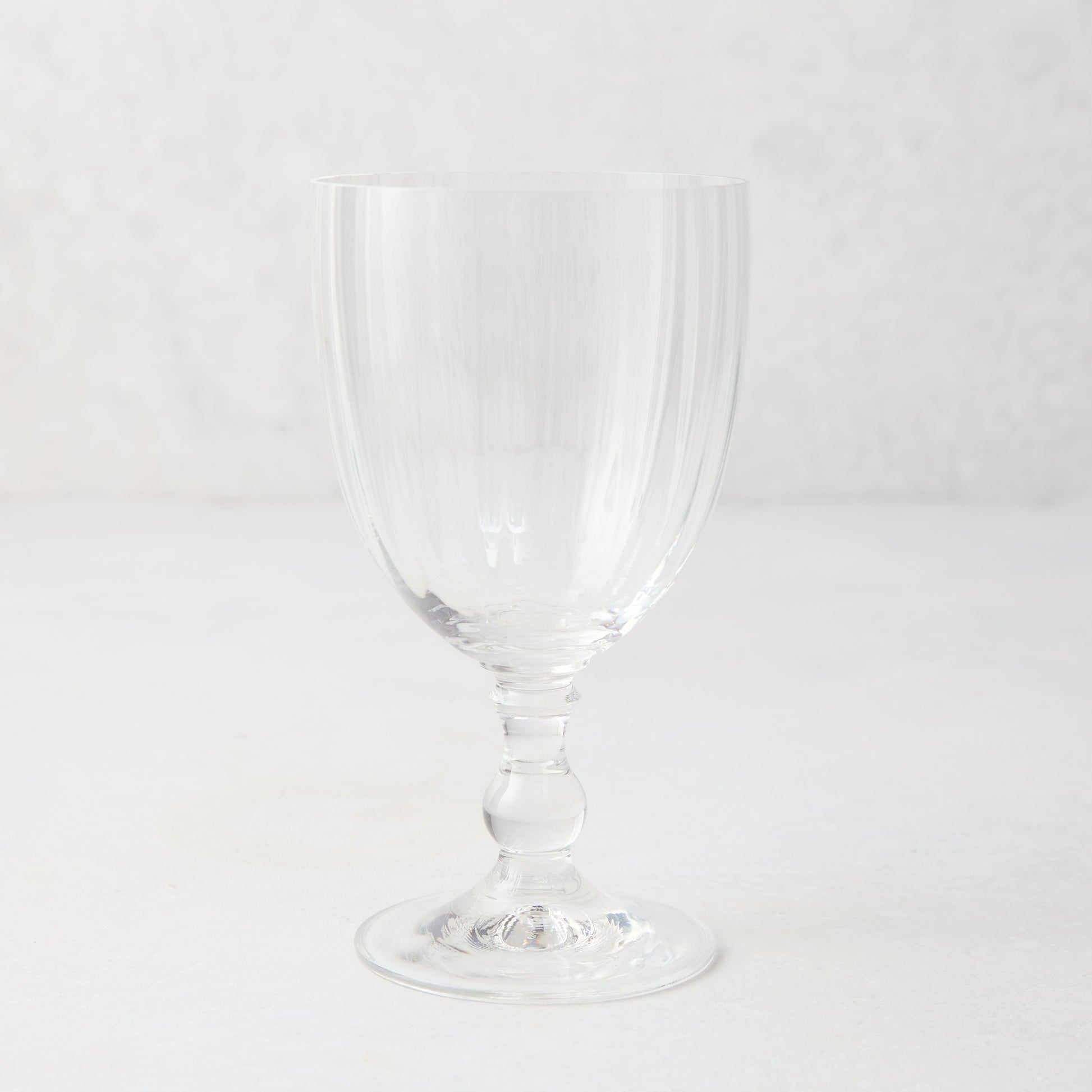 Clear Georgia Eco-Crystal stemmed wine glass, 12oz, with ribbed bowl and round stem detail.