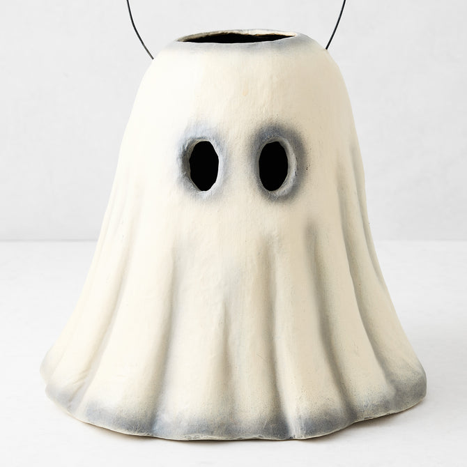 Vintage-style white papier-mâché ghost candy bucket with distressed grey shading and a black wire handle.