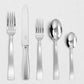 Gio Ponti 5-piece stainless steel flatware set with mirror finish: table fork, knife, dessert fork, spoons.