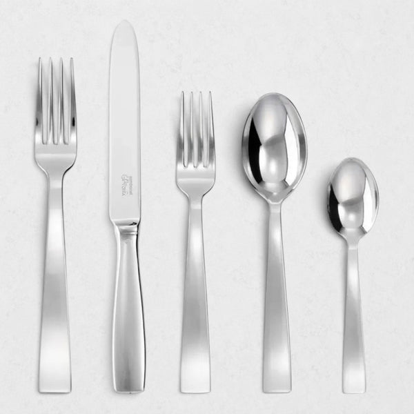 Gio Ponti 5-piece stainless steel flatware set with mirror finish: table fork, knife, dessert fork, spoons.