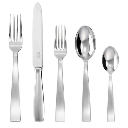 Gio Ponti 5-piece stainless steel flatware set with mirror finish: table fork, knife, dessert fork, spoons.