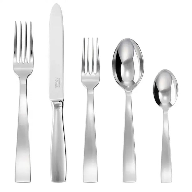 Gio Ponti 5-piece stainless steel flatware set with mirror finish: table fork, knife, dessert fork, spoons.