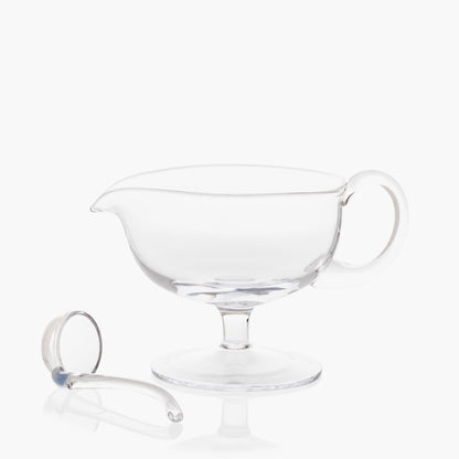 Clear glass sauce/gravy boat with handle and spout, 12.5 oz, with matching glass ladle.