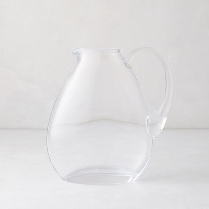 Clear mouth-blown glass teardrop pitcher with handle, 84.5oz, on a light background.