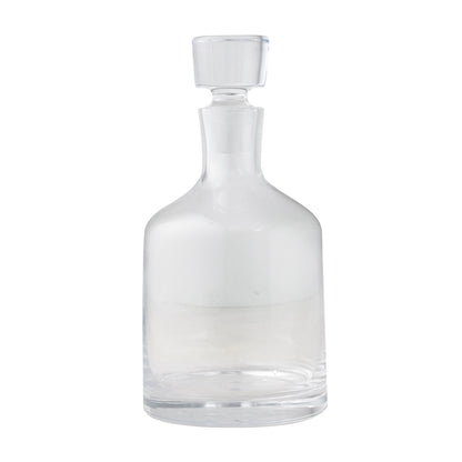 Clear mouth-blown glass wine and whiskey decanter with broad base, curved neck, and stopper.