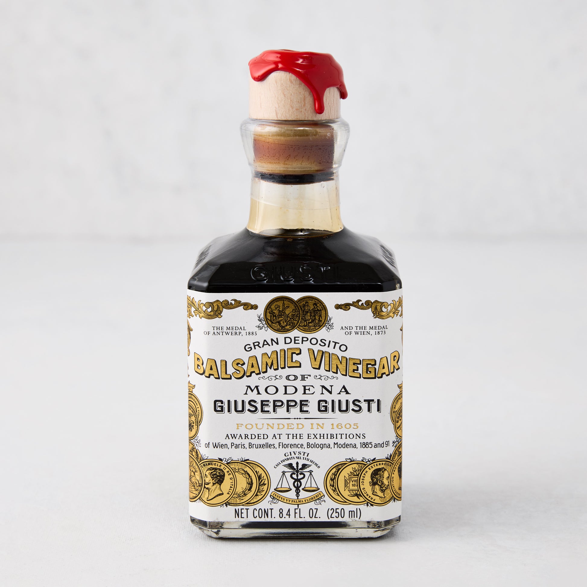 Giuseppe Giusti Gold Medal Balsamic Vinegar, 8.4oz bottle with red wax seal and gold label.