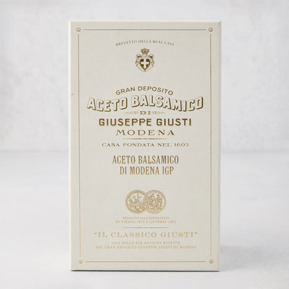 Giuseppe Giusti Gold Medal Balsamic Vinegar of Modena, 8.4oz, in a cream-colored box with gold text.
