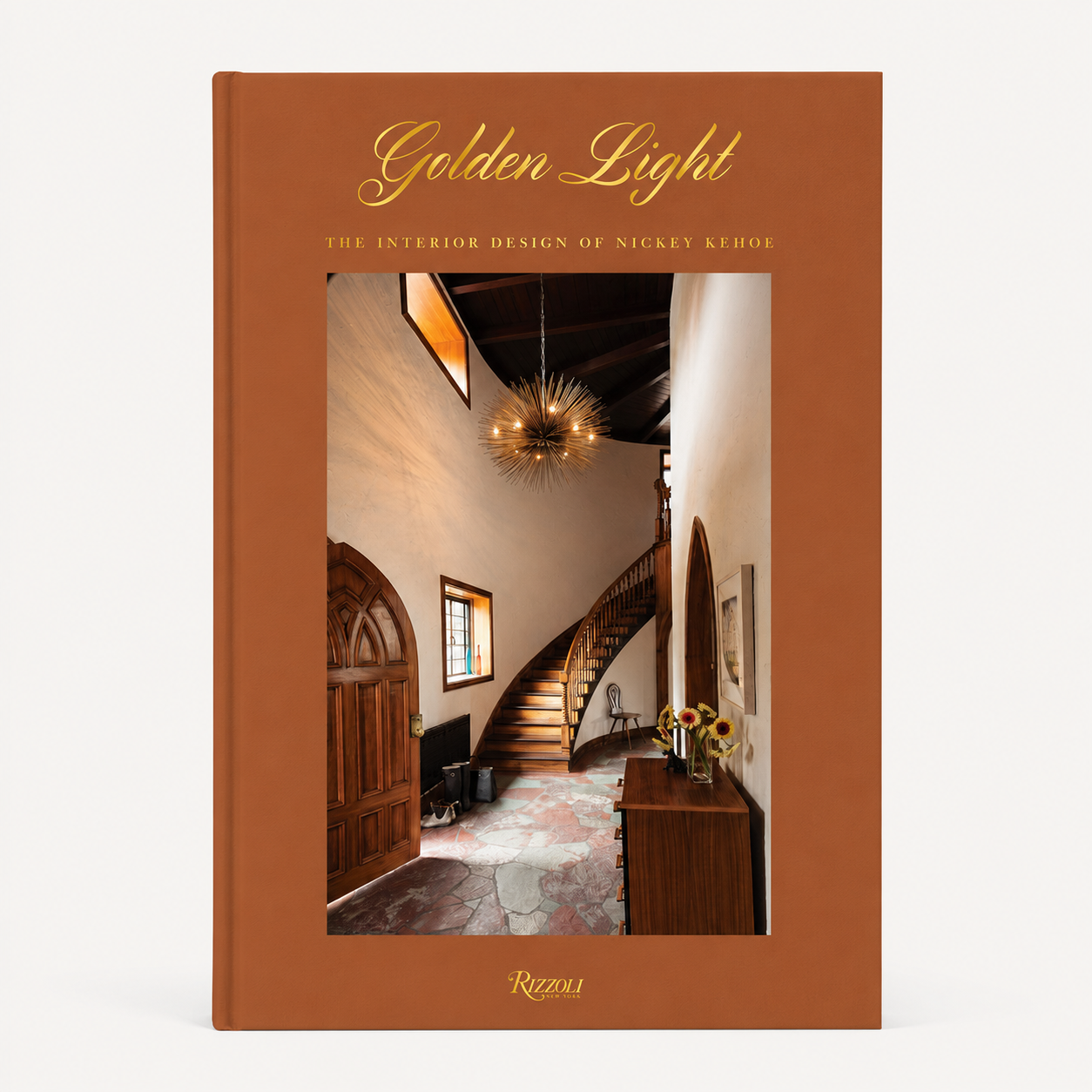 Golden Light hardcover book by Nickey Kehoe with a rust-colored cover and an interior design photo on the front.