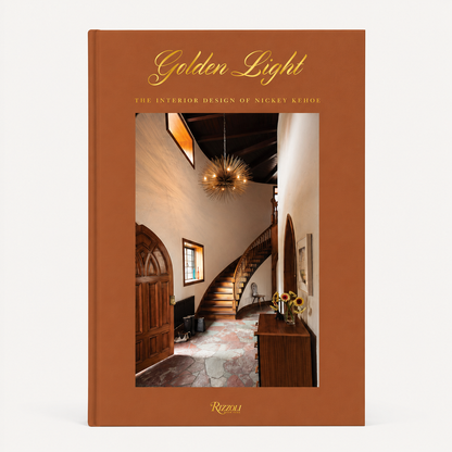 Golden Light hardcover book by Nickey Kehoe with a rust-colored cover and an interior design photo on the front.