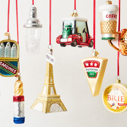 Hand-painted glass and resin golf cart Christmas ornament with clubs on back, red and green.