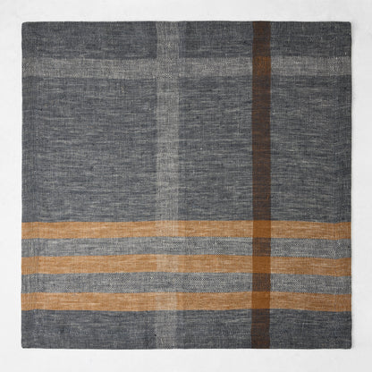 21-inch square linen napkin in graphite gray and camel brown with a herringbone weave and modern plaid pattern.