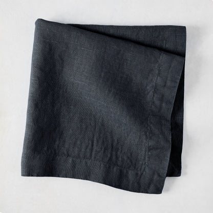 Graphite HG Signature hand-dyed 22-inch square linen napkin, folded.