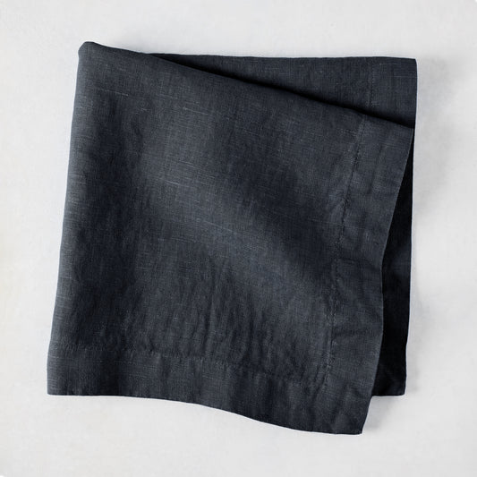 Graphite HG Signature hand-dyed 22-inch square linen napkin, folded.