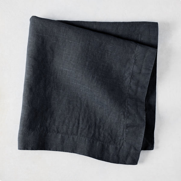 Graphite HG Signature hand-dyed 22-inch square linen napkin, folded.