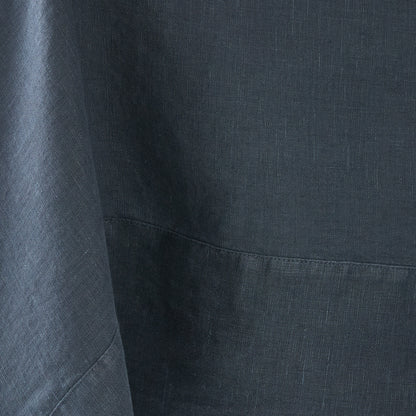 Graphite hand-dyed 100% linen tablecloth with a detailed mitered border and soft, textured fabric finish.