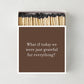Oversized matchbox in brown with white text reading Grateful for Everything, containing 4-inch matches with black tips.