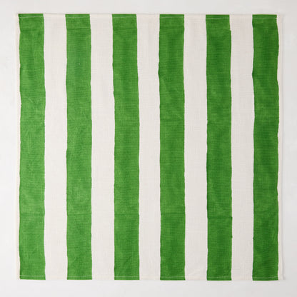 Green Hampton Cotton Stripe Napkin, 22" square, with bold green and white vertical stripes.