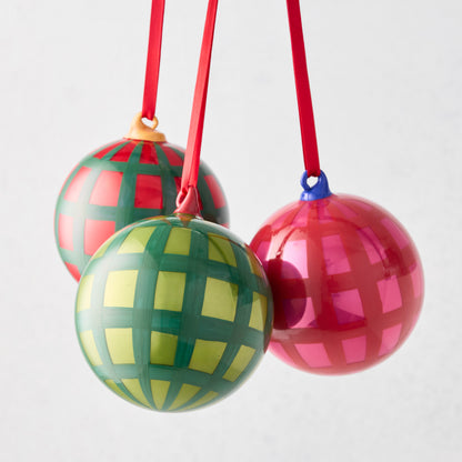Three HG Green Jolly Gingham Bauble Christmas tree ornaments: red, green, and pink, with red ribbons.