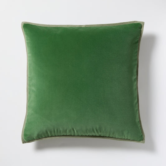 Celadon linen and meadow velvet 22" square reversible pillow with green trim.