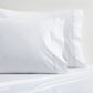 White percale pillowcases with green scallop stitch trim, set of 2.