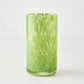 Green spotted highball glass with clear glass base, 3.3"Dia x 5.7"H.