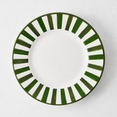 Round white ceramic salad plate featuring a hand-painted green striped border on a plain white background.